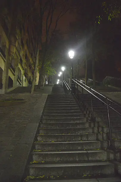 one of the famous staircases leading to Montmartre and the Sacre Coeur in Paris, France.