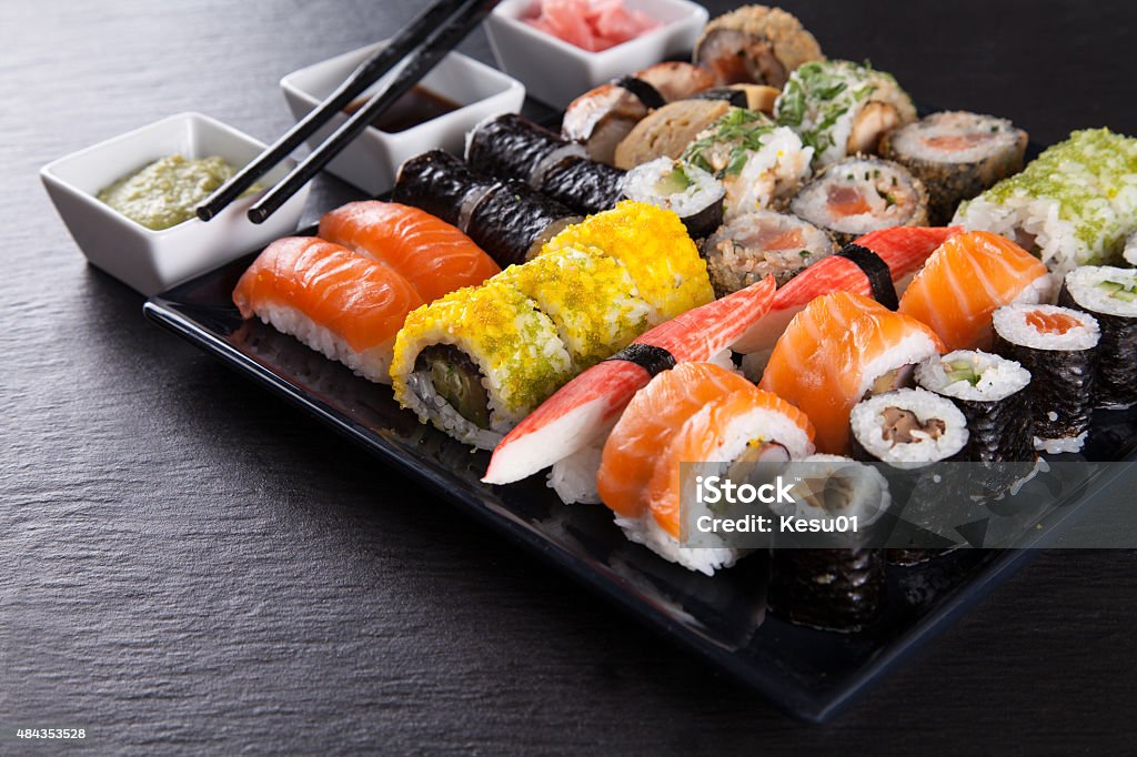 Japanese seafood sushi set Japanese seafood sushi set on black background 2015 Stock Photo
