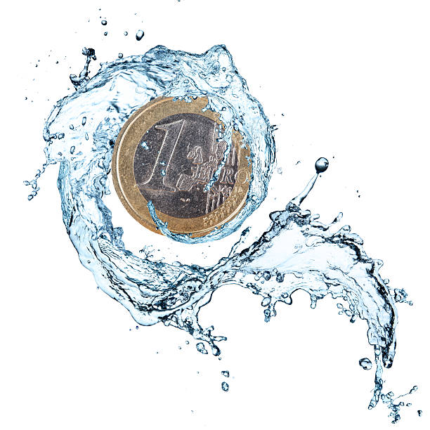 istock Euro coin with water splash. 484353738
