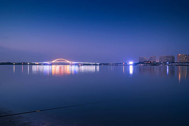 istock Xiamen wuyuan bridge at night 484354130