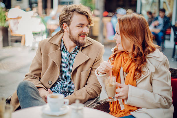 istock Young couple enjoying at cafe in autumn. 484357416