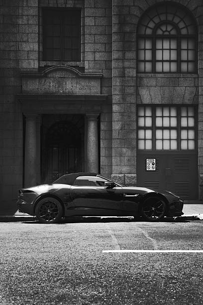 Cape Town, South Africa - January 4, 2015: A Jaguar F-Type roadster is seen parked on a street in Cape Town with the soft top roof on.