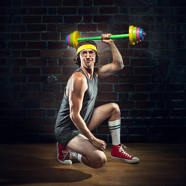 istock Nerd Weightlifter Lifting Childrens Toy Barbell 484367484