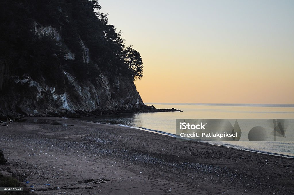 Rocky beach Late evening on a rocky beach Awe Stock Photo