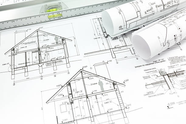 istock Blueprint with rolls and spirit level 484373059