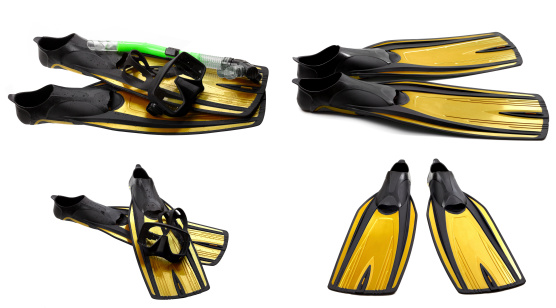 Set of yellow swim fins, mask and snorkel for diving isolated on white background