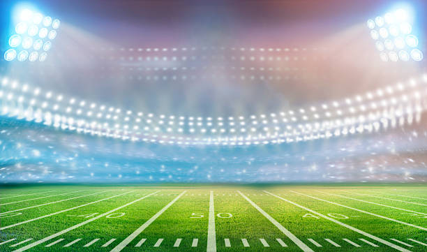 stadium Image of stadium in lights and flashes american football field photos stock pictures, royalty-free photos & images