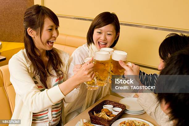 Young People Having A Toast Stock Photo - Download Image Now - Beer - Alcohol, Drinking, Japanese Ethnicity