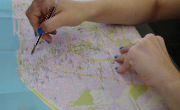 istock Hand Pen Pointing Where To Go With Paper Map 484374710