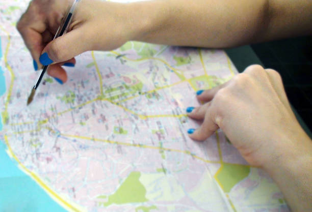istock Pen Pointing Where To Go With Paper Map 484374716