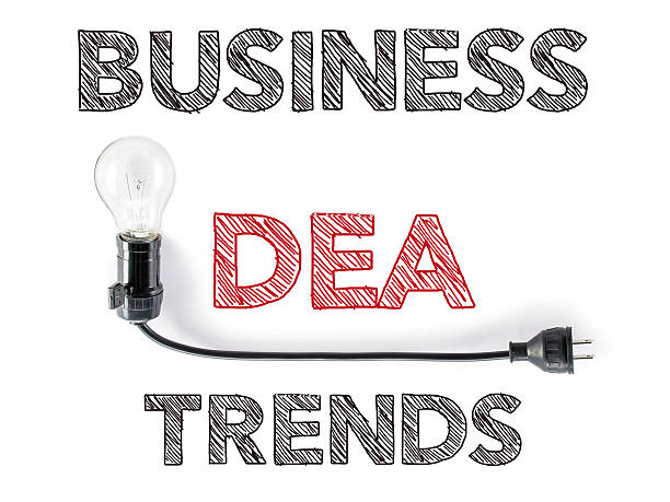 бизнес идея тенденции, лампа накаливания, иллюстрации, hand writing марта - plug патрон стоковые фото и изображения