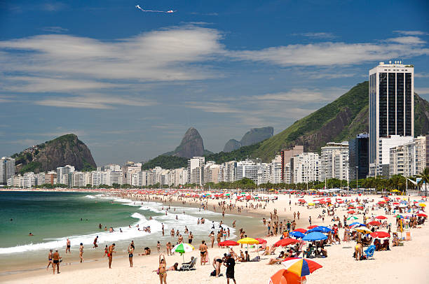 Rio de Janeiro, Brazil - January 13, 2012: Thousands of brazilians enjoy hot and sunny weekend in Copacabana beach.