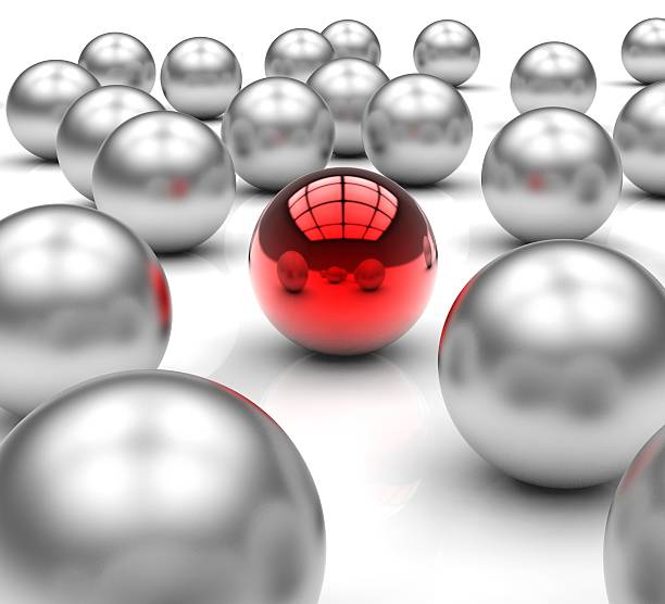 istock Standing Out Metallic Balls Shows Leadership 484376939