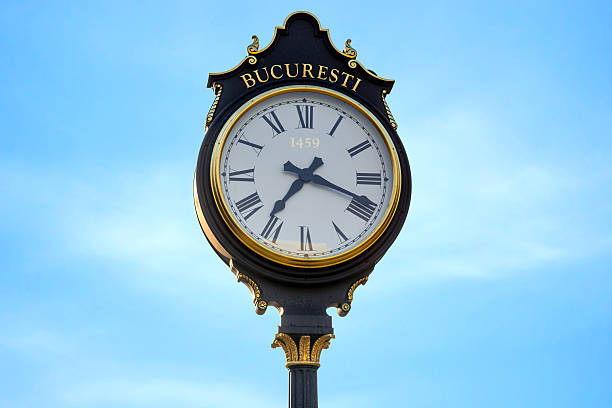 istock Parliament clocks in Bucharest city 484376944