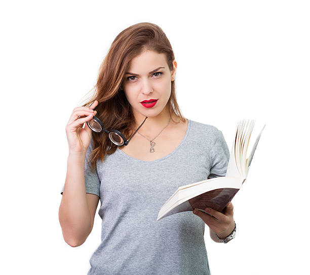 istock Attractive woman with reading glasses 484376990