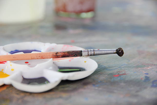 istock Paintbrush place on a palette 484381478