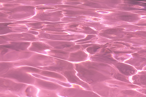 Pink Pool Water With Sun Reflections Stock Photo - Download Image Now ...
