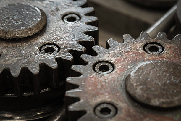 istock Close up meshing gear for industrial background 484386636