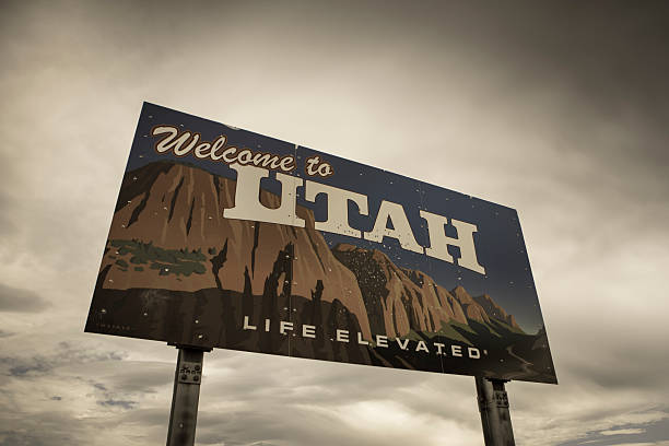 istock Welcome sign to Utah under cloudy sky 484387082