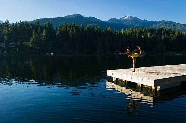 istock Royal Dancer Tranquil Lakeside meditation at sunrise 484393286