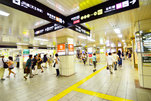 Osaka, Japan - August 08, 2013: People across Tennoji subway station in August 08 2013, one of the busiest in Osaka