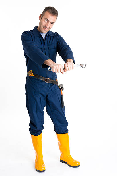 istock Portrait of an handsome Worker using a wrench 484400659