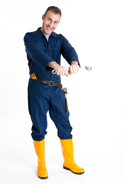 istock Portrait of an handsome Worker using a wrench 484400661