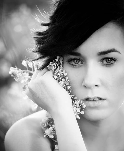 istock Girl with flowers. 484401363
