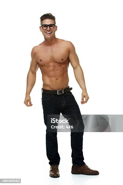 Muscular Man Posing Stock Photo - Download Image Now - 20-29 Years, 2015, Abdominal Muscle