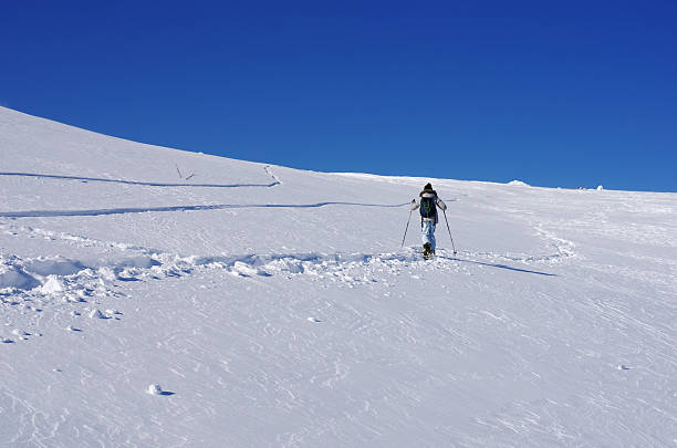 istock Girl uphill winter snow 484403661