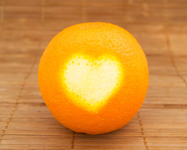 Heart on orange stock photo