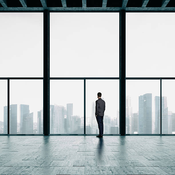 istock Businessman looking at the city 484411484