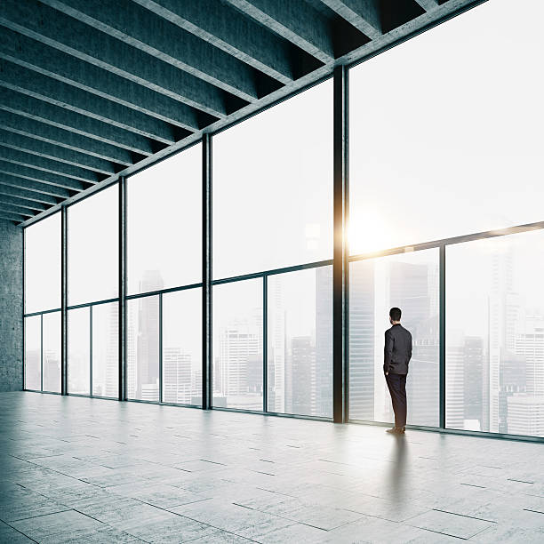 istock Business man looking at big city 484411488