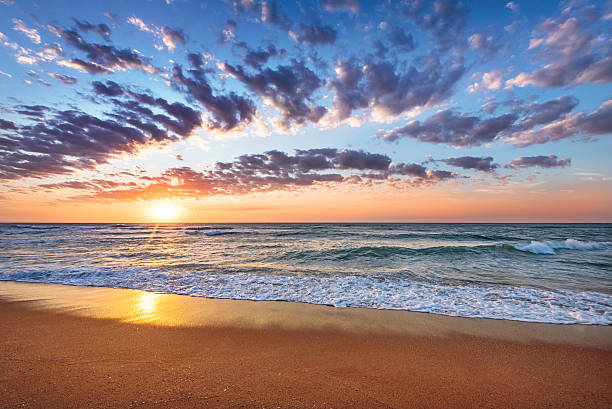 istock Beach and sea sunrise. 484411940