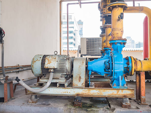 istock Old electric water pumps, full of rust. 484411960
