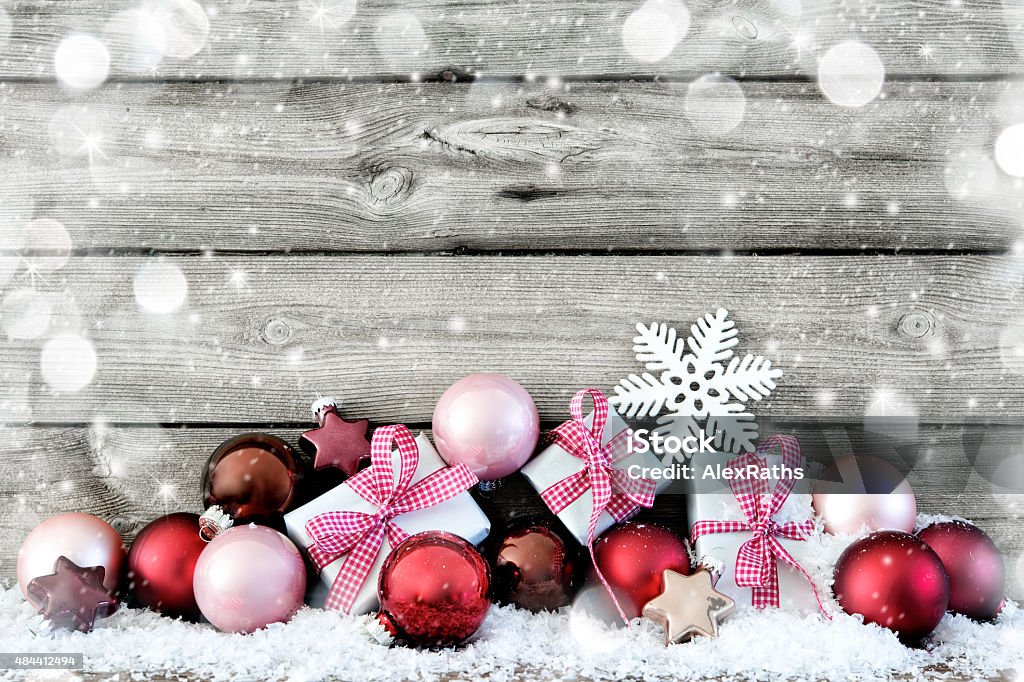 Christmas background Christmas composition with colorful balls and gift boxes on snow 2015 Stock Photo