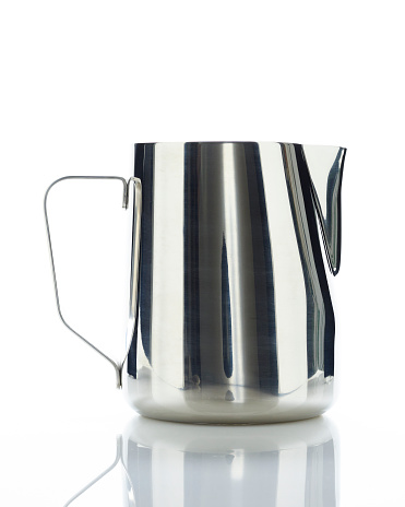 Stainless steel frothing pitcher for making coffee