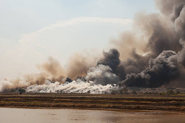 istock Burning garbage heap of smoke 484417102