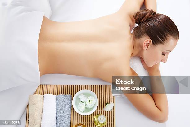 Young Beautiful Woman In Spa Environment Stock Photo - Download Image Now - 2015, Adult, Adults Only