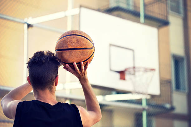 young basketball player ready to shoot