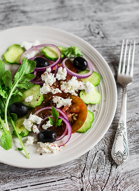 istock Greek salad on a white plate 484426896