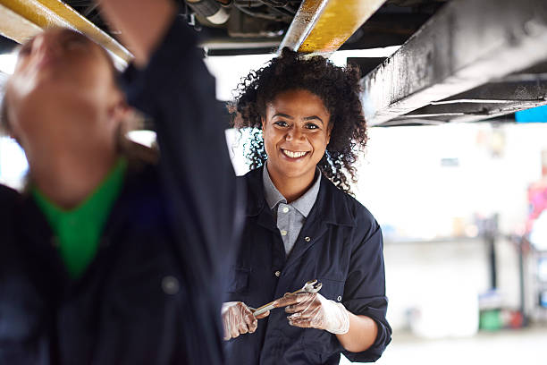 istock female garage mechanic portrait 484427700