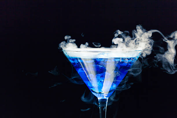 istock blue cocktail with ice vapor 484427945