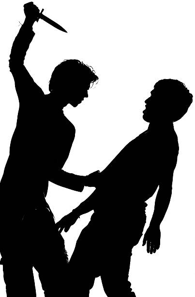istock Silhouette of an attack with a knife 484428017