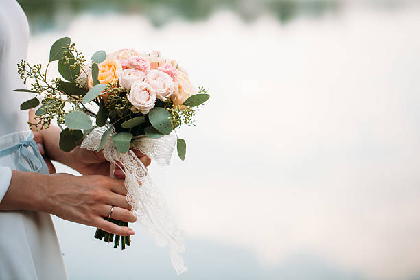 istock wedding bouquet of flowers in hands 484428096