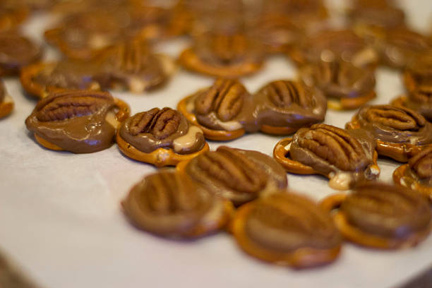 istock Pecan topped Chocolate Covered Pretzels 484428204