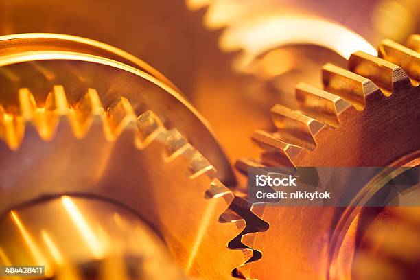 Golden Gear Wheels Stock Photo - Download Image Now - Gear - Mechanism, Machinery, Close-up