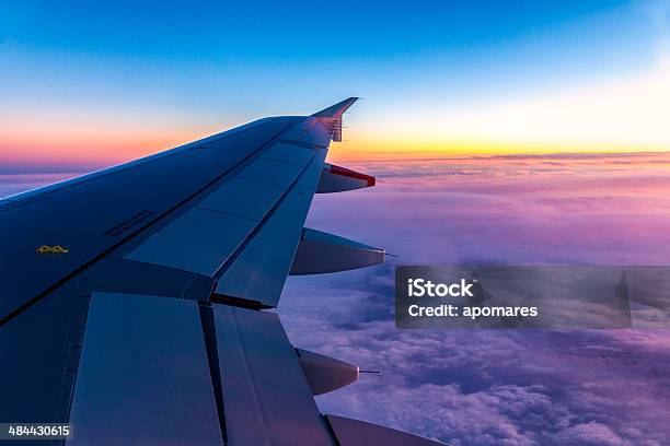 Classic Image Of Wing Clouds And Wingtip On Comercial Airplane Stock Photo - Download Image Now