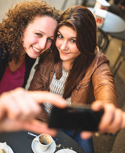 istock Couple of friends doing a selfie 484430819