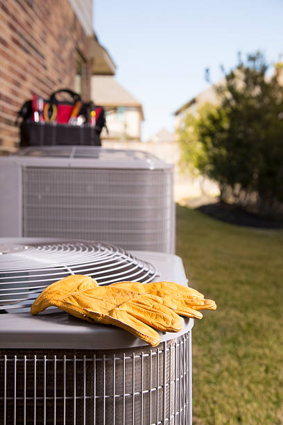 istock Service Industry:  Work tools, air conditioners. Outside residential home. Summer 484432510